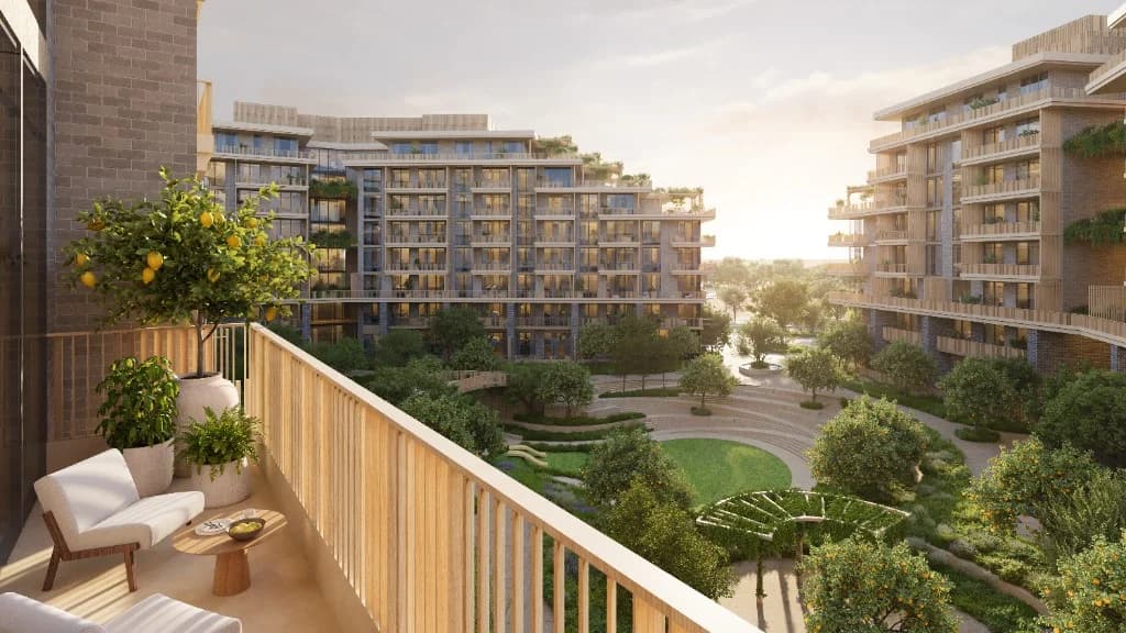 Arancia Yards 2 by Beyond central green valley at evening, City of Arabia Dubai
