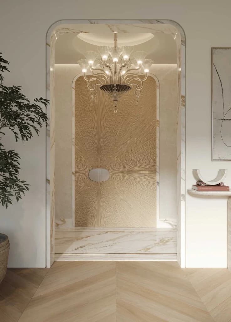 Baccarat Residences Saadiyat by Aldar grand entrance foyer with sunburst door and crystal chandelier, Saadiyat Island Abu Dhabi