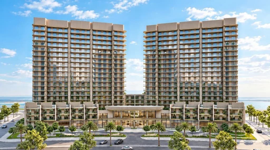 The Views by Ardee twin towers front facade at golden hour, Al Marjan Island