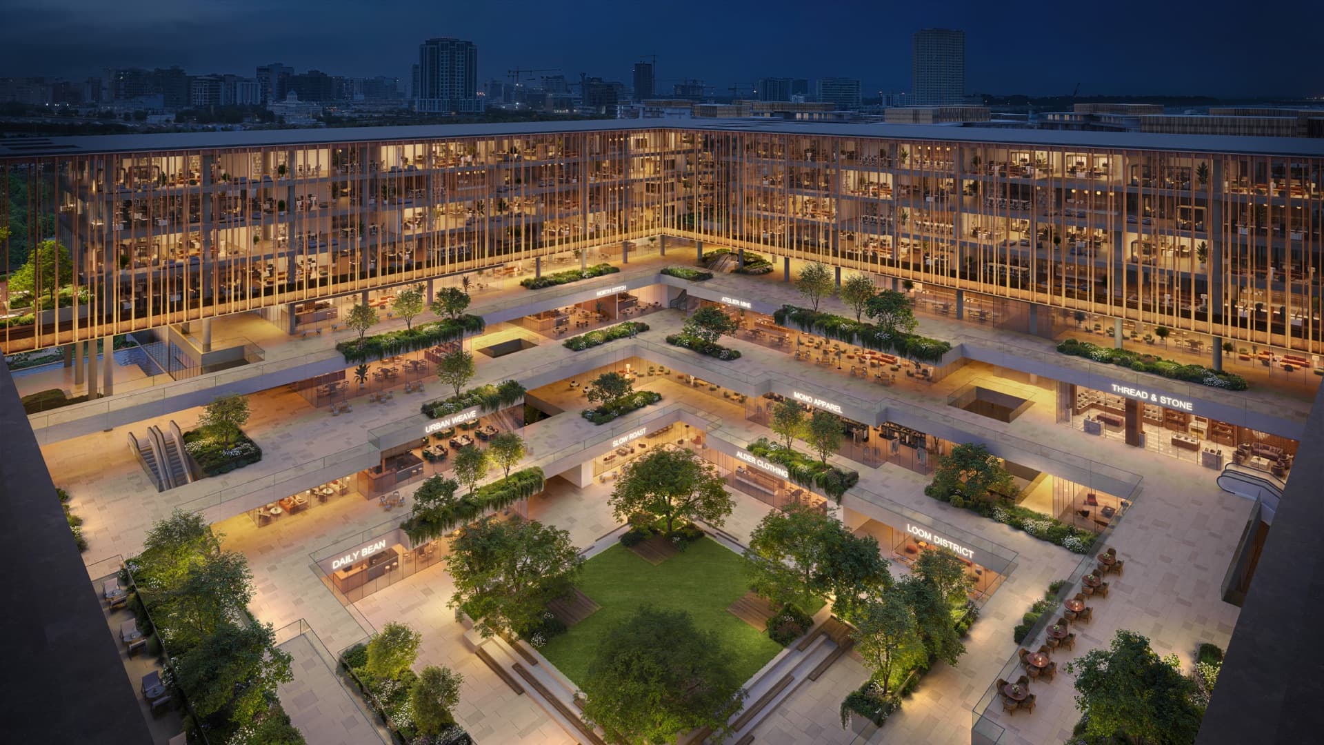 Central courtyard by night at The Yards Plaza, City of Arabia, Dubai
