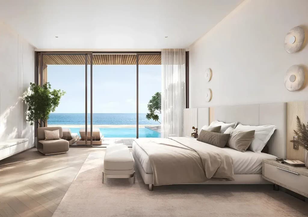 Bedroom with pool and ocean view at Y Views at Bayn, ORA villas in Ghantoot, Abu Dhabi